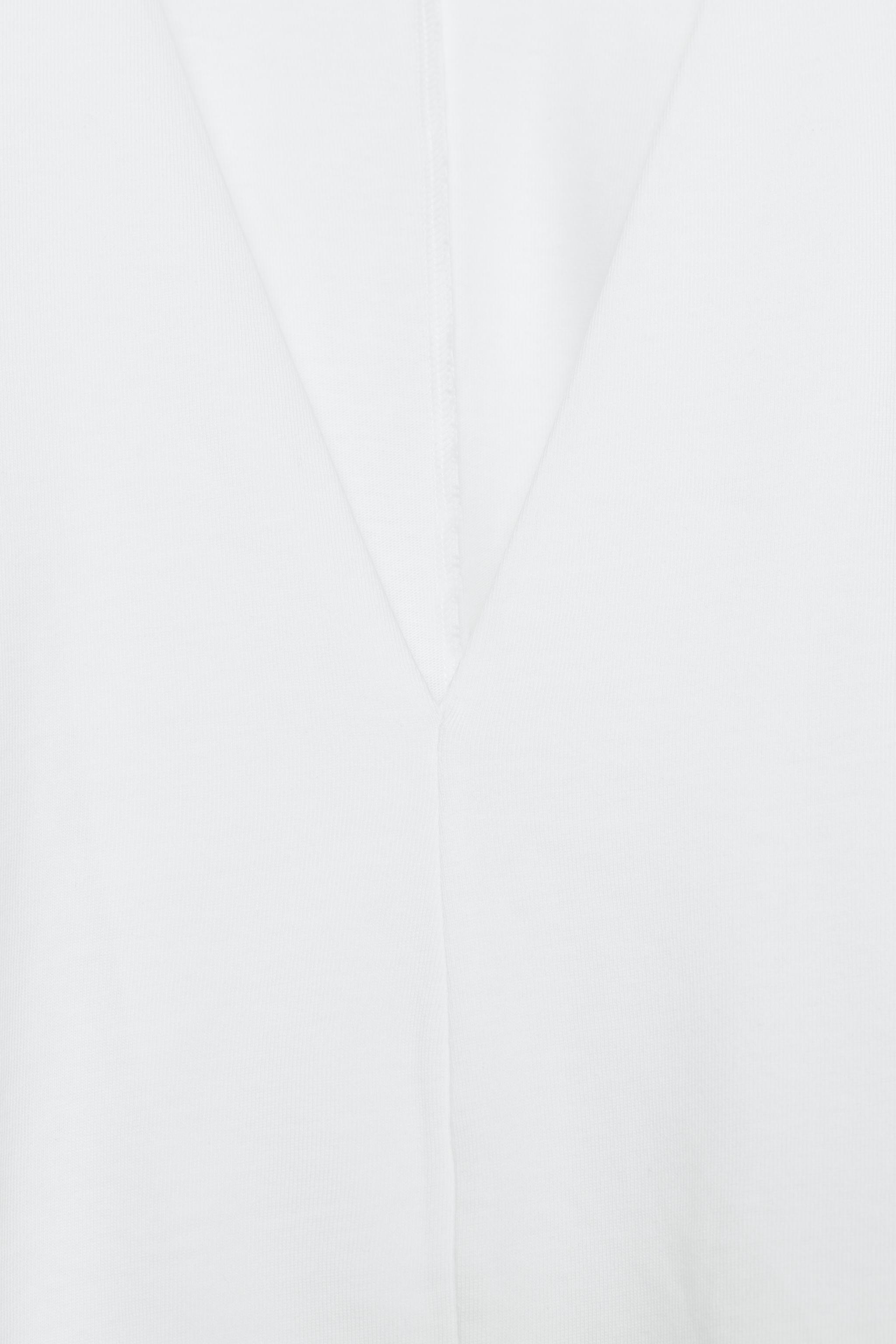 VOLUMINOUS HEAVY COTTON CAPE TOP